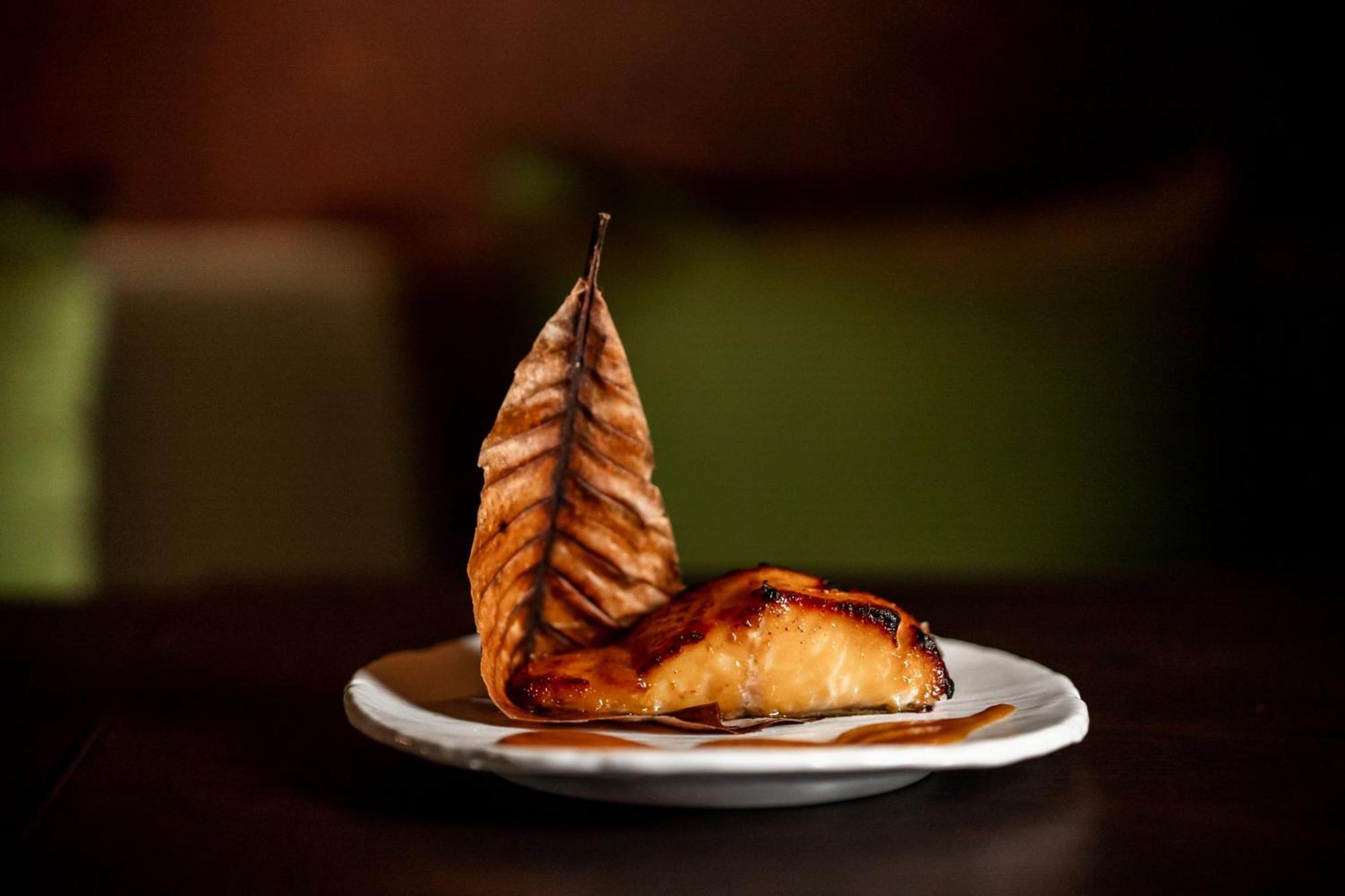 The Dubai Edition Eksteriør billede Smoked and grilled salmon